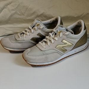 Off white and gold sneakers